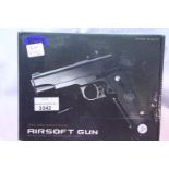 Airsoft V9 gold coloured hand gun, boxed. P&P Group 1 (£14+VAT for the first lot and £1+VAT for