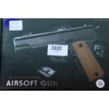 Airsoft V11 tan coloured hand gun, boxed. P&P Group 1 (£14+VAT for the first lot and £1+VAT for