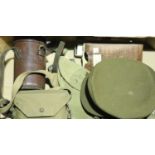 Mixed British WWII type field equipment, including a canvas holster, canteen, packet of eye