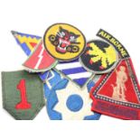 Ten WWII type US Army Patches. P&P Group 1 (£14+VAT for the first lot and £1+VAT for subsequent