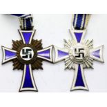 Two German Third Reich type Mother's Crosses in bronze and silver, each dated 16 December 1938