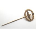 German WWII type gold plated Kriegsmarine stick pin, marked Fleck of Hamburg to verso, L: 5.5 cm.