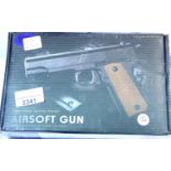 Airsoft V11 tan coloured hand gun, boxed. P&P Group 1 (£14+VAT for the first lot and £1+VAT for