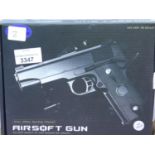 Airsoft V9 gold coloured hand gun, boxed. P&P Group 1 (£14+VAT for the first lot and £1+VAT for