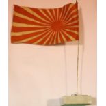 Japanese Imperial WWII type staff car flag, later mounted on a square marble plinth, H: 27 cm (