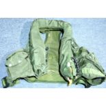 Olive green military issue self inflating buoyancy aid, Post WWII. P&P Group 2 (£18+VAT for the