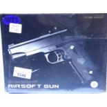 Airsoft V9 gold coloured hand gun, boxed. P&P Group 1 (£14+VAT for the first lot and £1+VAT for