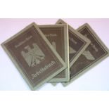 Four German Third Reich and WWII type Arbeitsbuch work record books, all part filled. P&P Group