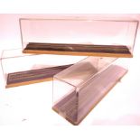 Three locomotive display cases, wood base, perspex lift off top, track on underlay, 35 x 80 x 100