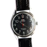 HMT Pilot Parashock mechanical stainless steel black faced wristwatch on a black leather strap.