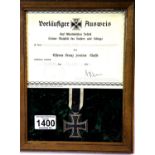 Framed WWI Iron Cross 2nd Class with Award Certificate. The Medal is 3 part construction with an
