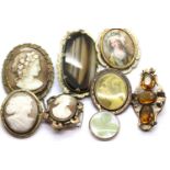 Collection of vintage pinchbeck mounted brooches including cameos. P&P Group 1 (£14+VAT for the