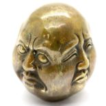 Four faced Buddha head with impressed seal mark to base, H: 6 cm. P&P Group 1 (£14+VAT for the first