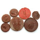 Seven 19th century Grand Tour wax seals, largest D: 45 mm, two damaged. P&P Group 1 (£14+VAT for the