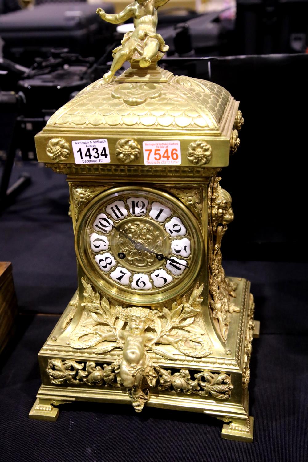 A 19th century French ormolu and lacquered brass 8 day table clock, chiming on a gong, circa 1870,