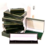 Seven as-new green leather effect fitted necklace boxes and a bracelet box. P&P Group 3 (£25+VAT for