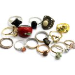 Sixteen mixed fashion rings. P&P Group 1 (£14+VAT for the first lot and £1+VAT for subsequent lots)