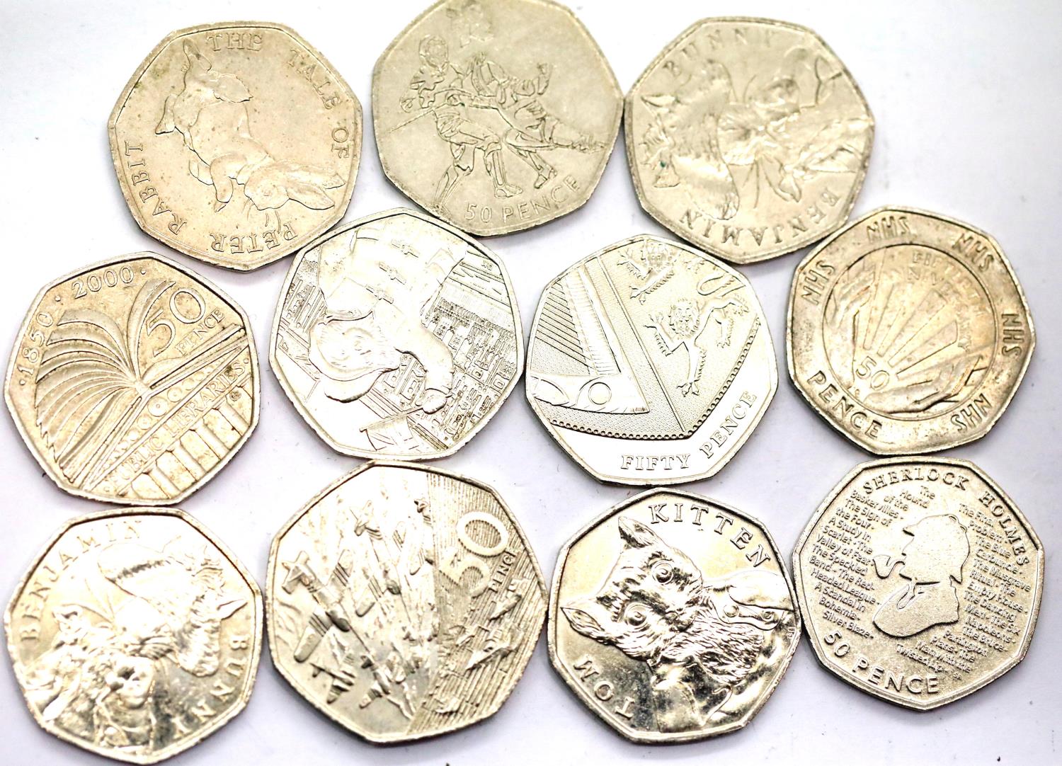 Eleven mixed 50p pieces including Beatrix Potter, Olympics and D Day. P&P Group 1 (£14+VAT for the