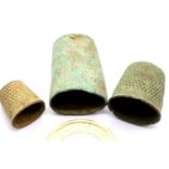 Three Bronze thimbles to include 1 of a small childs. P&P Group 1 (£14+VAT for the first lot and £