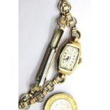 Ladies 9ct gold cased Rotary wristwatch on an unmarked yellow metal bracelet, 12.7g. P&P Group 1 (£