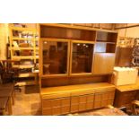 Large McIntosh teak retro wall unit with glazed doors to the upper section and storage to the