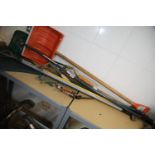 Quantity of mixed garden tools including garden rakes and edging strip. Not available for in-house