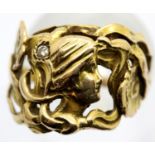 Art Nouveau presumed 18ct gold (unmarked) diamond set dress ring, the body of floral design