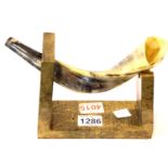 Israeli horn Shofar on a stand. P&P Group 2 (£18+VAT for the first lot and £3+VAT for subsequent