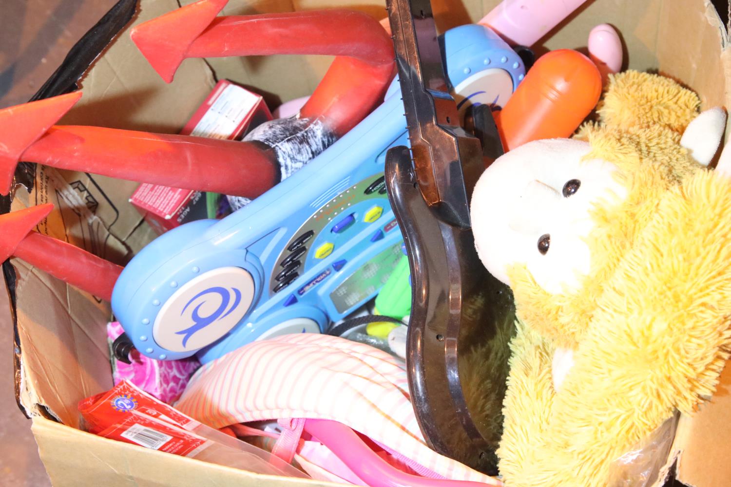 Box of mainly children's toys including teddies, guitars etc. Not available for in-house P&P