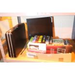 Box of mixed items including books, PC monitor and an attache case. Not available for in-house P&P