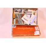 Box containing a small collection of vintage cigarette cards. P&P Group 1 (£14+VAT for the first lot