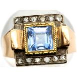 Georgian presumed 15ct rose gold dress ring, set with a large square cut aquamarine, flanked by