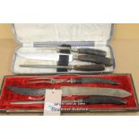 *Three piece carving sets with stag antler handles^ one by Joseph Rogers^ the other J Hurst & Co.^