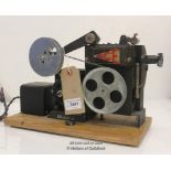 A Pathescope Ace 9.5mm cine film projector.