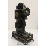 A Pathescope Baby 9.5mm cine film projector, 32cm.