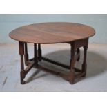 *ANTIQUE OAK ROUND DROP DOWN TABLE, CIRCA 1800. 1420MM ( 56" ) WIDE X 1205MM ( 47.5" ) DEEP X