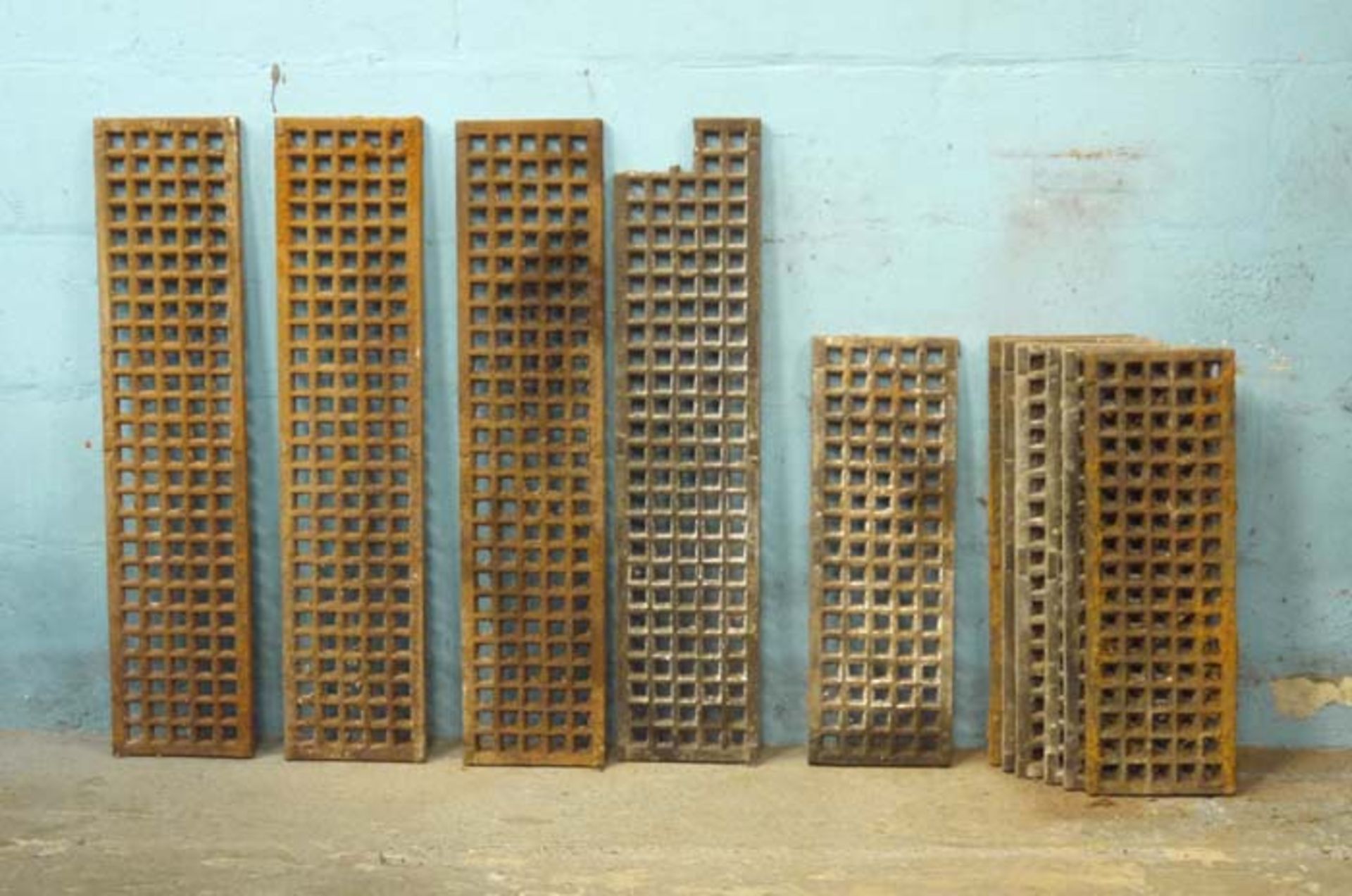 *TWELVE CAST IRON FLOOR GRILLES, CIRCA 1910. 202MM ( 8" ) WIDE X 18MM ( 0.75" ) DEEP. 2 X 1220MM (