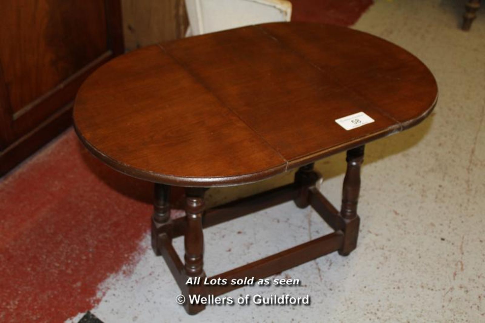 *SMALL OVAL TABLE. HEIGHT 480MM (19 INCHES) X WIDTH 740MM (29.25INCHES) X DEPTH 485MM (19.25 INCHES)