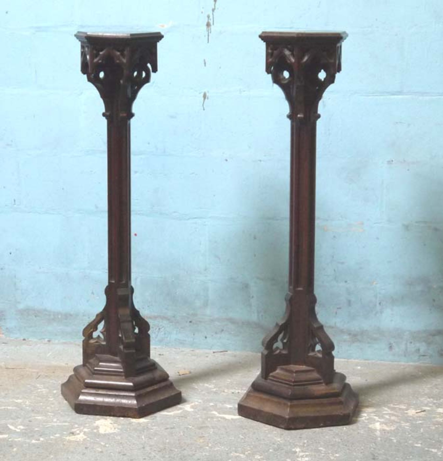 *PAIR OF VICTORIAN GOTHIC STANDS. 1220MM ( 48" ) HIGH. PLINTH 230MM ( 9" ) WIDE X BASE 360MM ( 14" )