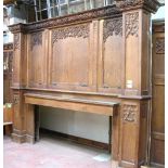 *LARGE OAK REREDOS ELABORATELY CARVED WITH FOLIAGE AND GOTHIC DESIGNS CIRCA 1890