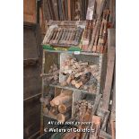 *SHELVING UNIT CONTAINING LARGE QUANTITY OF SPINDLES