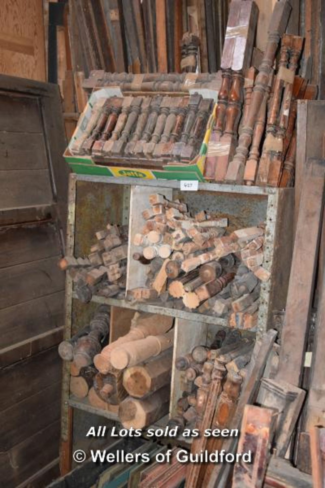 *SHELVING UNIT CONTAINING LARGE QUANTITY OF SPINDLES