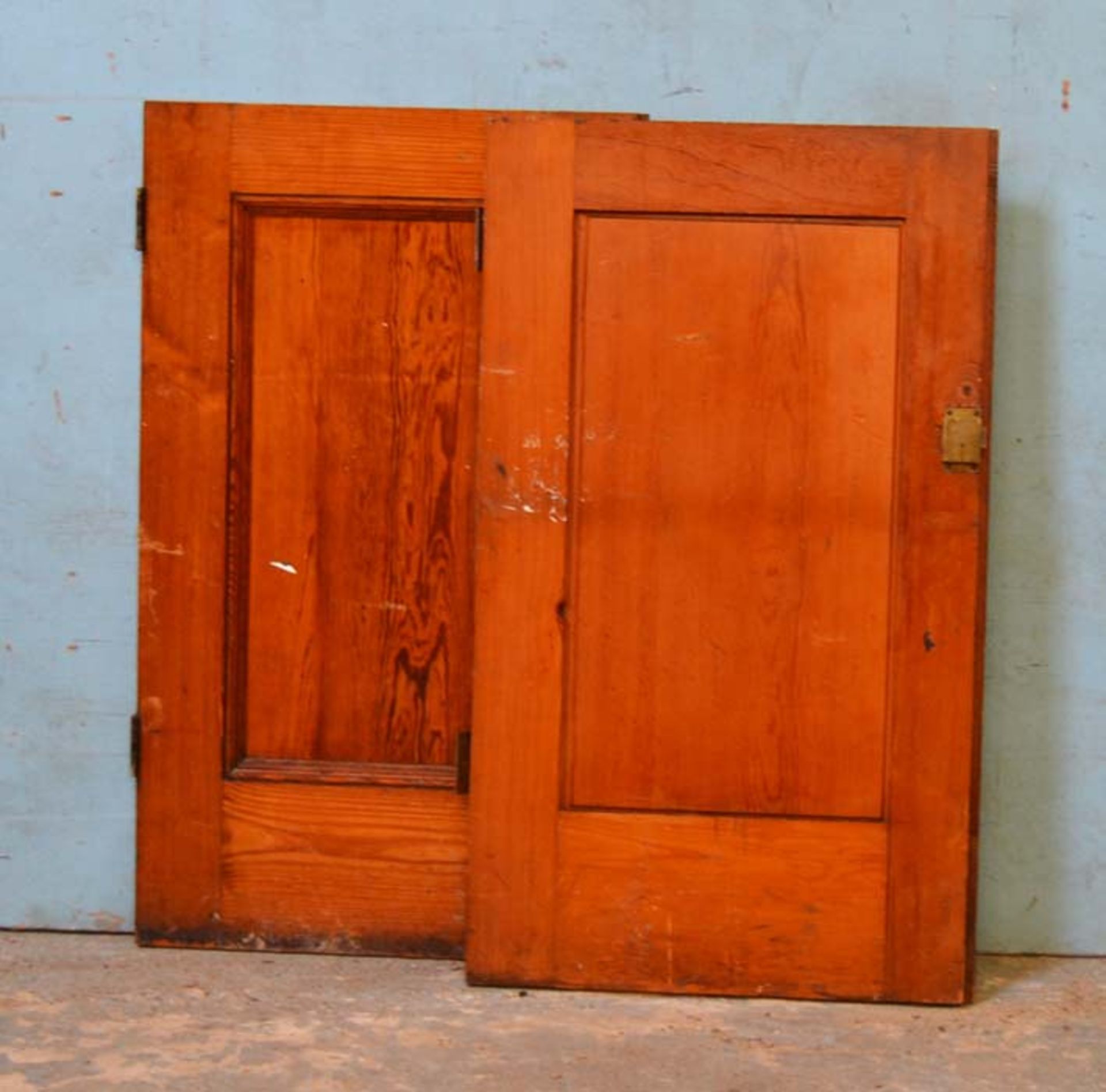 *PAIR OF PITCH PINE CUPBOARD DOORS. 1050MM (41.5") HIGH X 615MM (24.25") WIDE X 35MM (1.25") DEEP [