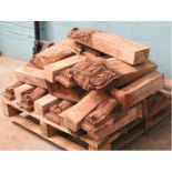 *19 WEATHERED ANTIQUE PINE CORBELS WITH LEAF MOTIF FROM A VICTORIAN SHOP FRONT. 730MM (29IN) HIGH