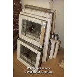 *COLLECTION OF SIXTEEN MATCHING LEADED LIGHT WINDOWS
