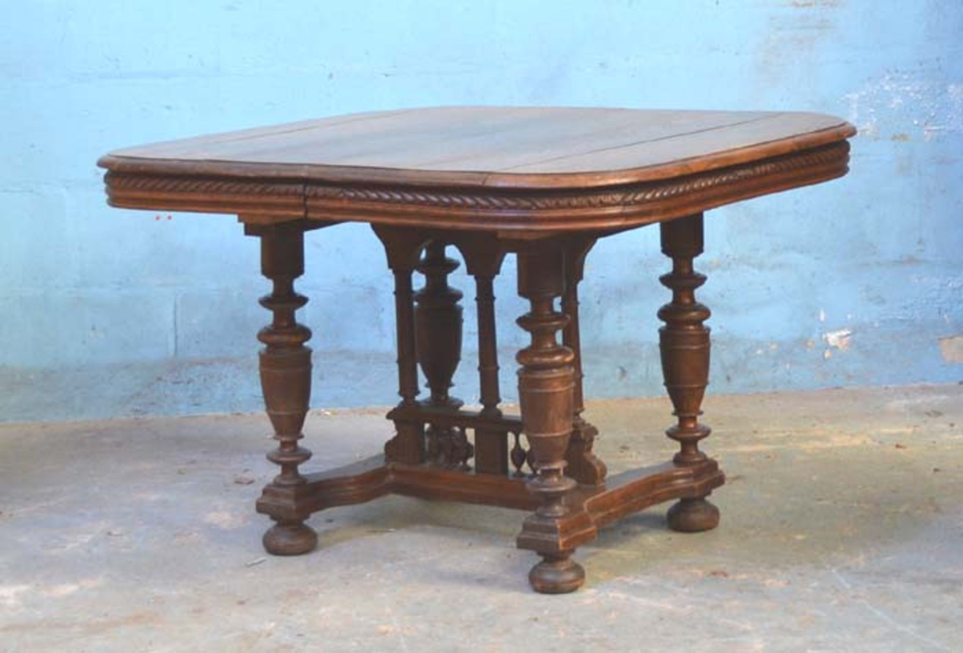 *OAK HENRI II STYLE TABLE. CIRCA 1900