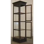 ANTIQUE TEAK SHOWCASE, LATE VICTORIAN. HEIGHT 2285MM (90IN) X WIDTH 545MM (21.25IN) X CORNICE DEPTH