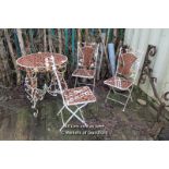 *DECORATIVE METAL GARDEN TABLE AND FOUR CHAIRS