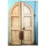 *ARCHED PAIR OF PINE DOORS, CIRCA 1900. 3320MM (130IN) HIGH X 970MM (38IN) WIDE X 70MM (2.75IN) DEEP