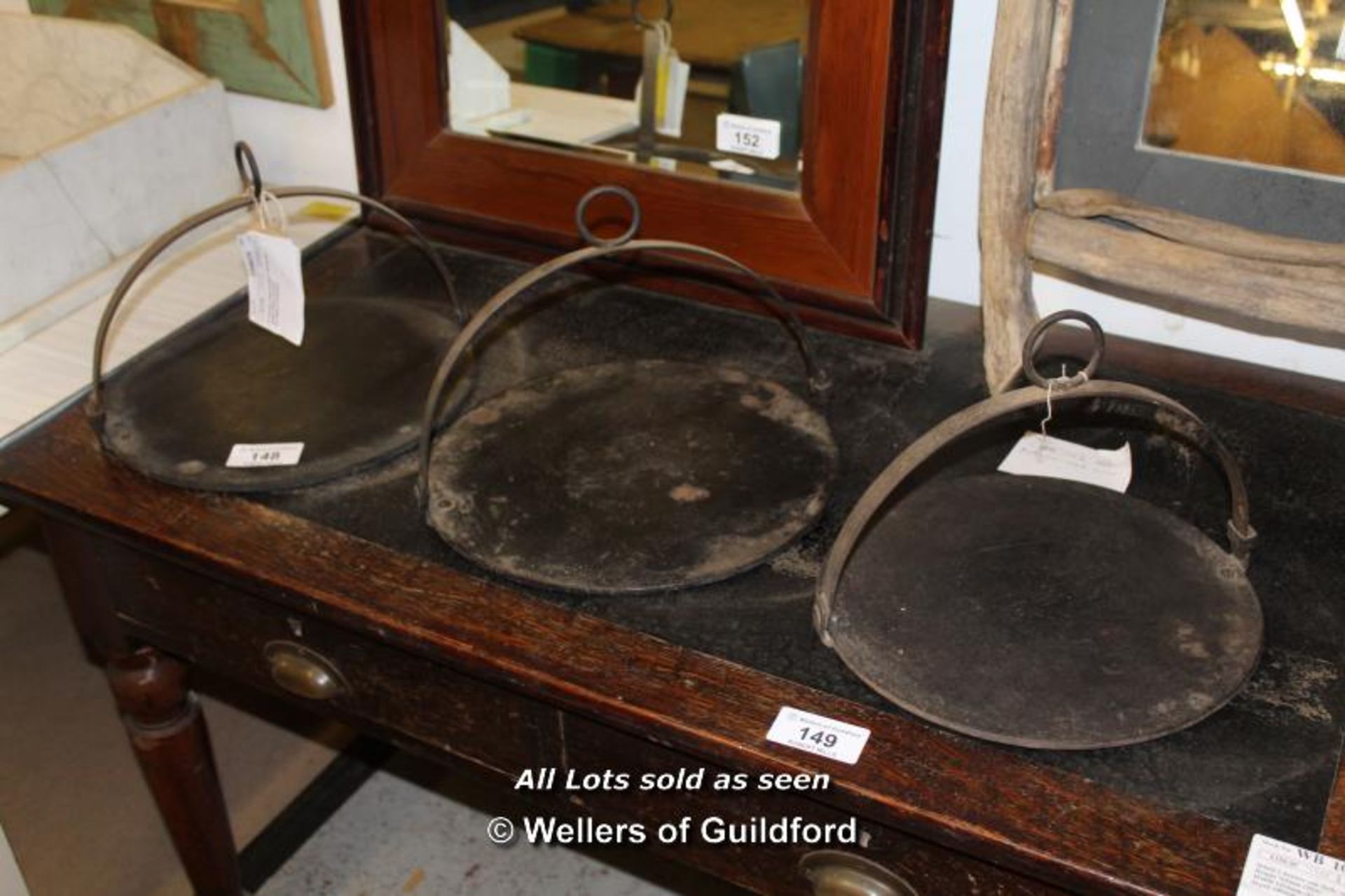 *THREE VICTORIAN RANGE HOT PLATES WITH HANDLES. HEIGHT 280MM (11INCHES) X DIAMETER 390MM (15.